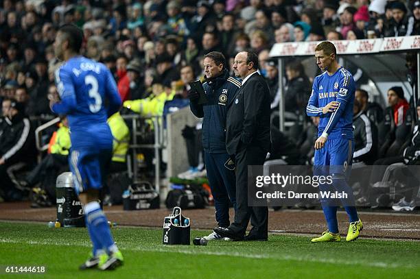 Chelsea interim manager Rafael Benitez as he prepares to bring on his player Fernando Torres