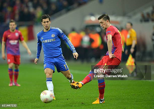 Chelsea's Eden Hazard and Steaua Bucuresti's Cornel Rapa battle for the ball