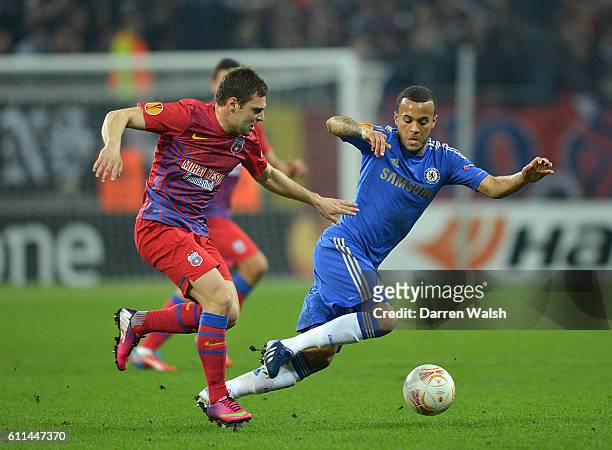 Chelsea's Ryan Bertrand and Steaua Bucuresti's Adrian Popa battle for the ball