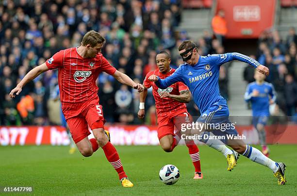 Chelsea's Fernando Torres in action with Southampton's Jos Hooiveld and Nathaniel Clyne