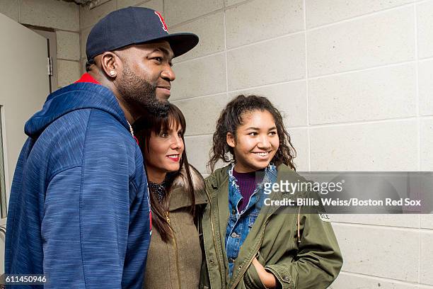 David Ortiz of the Boston Red Sox poses with his wife Tiffany and daughter Alex before his final game at Yankee Stadium against the New York Yankees...