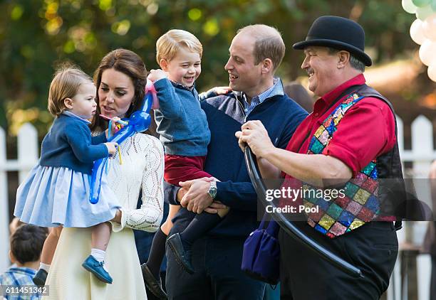 Prince William, Duke of Cambridge, Catherine, Duchess of Cambridge, Prince George of Cambridge and Princess Charlotte of Cambridge attend a...