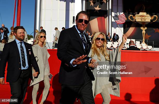 Phil Mickelson of the United States and Amy Mickelson attend the 2016 Ryder Cup Opening Ceremony at Hazeltine National Golf Club on September 29,...