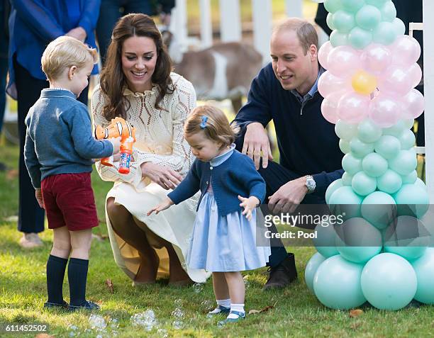 Prince William, Duke of Cambridge, Catherine, Duchess of Cambridge, Prince George of Cambridge and Princess Charlotte of Cambridge attend a...