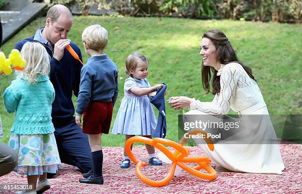 Prince William, Duke of Cambridge, Catherine, Duchess of Cambridge, Prince George of Cambridge and Princess Charlotte of Cambridge attend a...