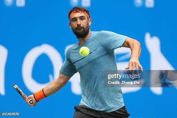 Marcos Baghdatis of Cyprus returns a shot during the match against Viktor Troicki of Serbia during Day 4 of 2016 ATP Chengdu Open at Sichuan...