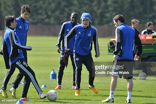 Chelsea's Yossi Benayoun, Oscar, David Luiz during a training session for the UEFA Europa League at the Cobham Training Ground on 1st May 2013 in...