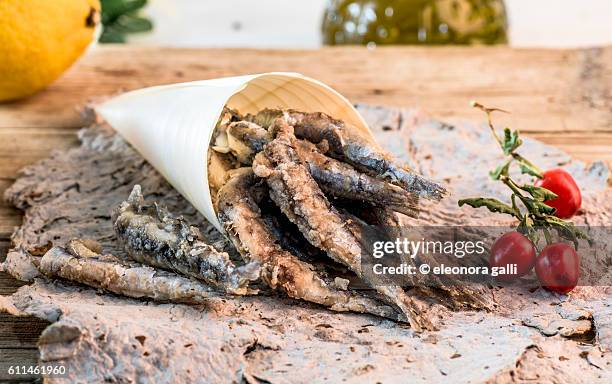 freid anchovies - anchovy stock pictures, royalty-free photos & images