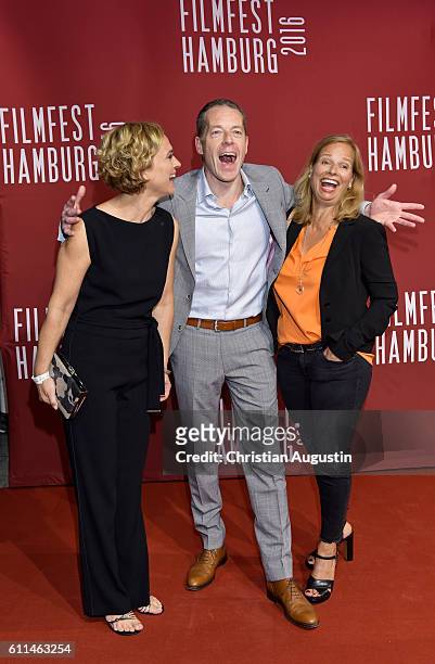 Caren Miosga, Oliver Sauer and Jennifer Schellack attend the premiere of 'Amerikanisches Idyll' during the opening night of Hamburg Film Festival...