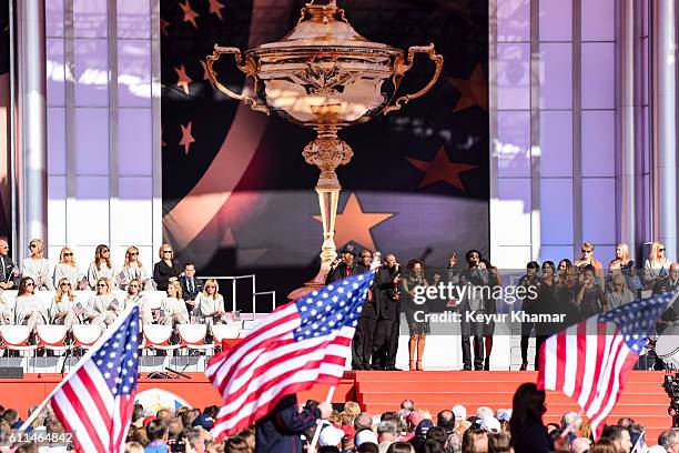 Recording artist Aloe Blacc performs on stage with Sounds of Blackness during the 2016 Ryder Cup Opening Ceremony at Hazeltine National Golf Club on...