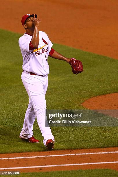 Stater Alex Reyes of the St. Louis Cardinals celebrates after recording the third out with the bases loaded against the Cincinnati Reds in the sixth...