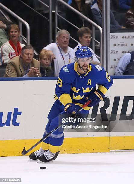 Erik Karlsson of Team Sweden stickhandles the puck against Team Europe at the semifinal game during the World Cup of Hockey 2016 tournament at the...