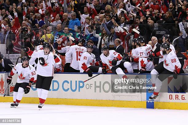 Team Canada celebrates their World Cup Championship over Team Europe during Game Two of the World Cup of Hockey final series at the Air Canada Centre...