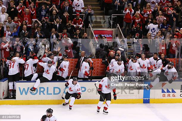 Team Canada celebrates their World Cup Championship over Team Europe during Game Two of the World Cup of Hockey final series at the Air Canada Centre...