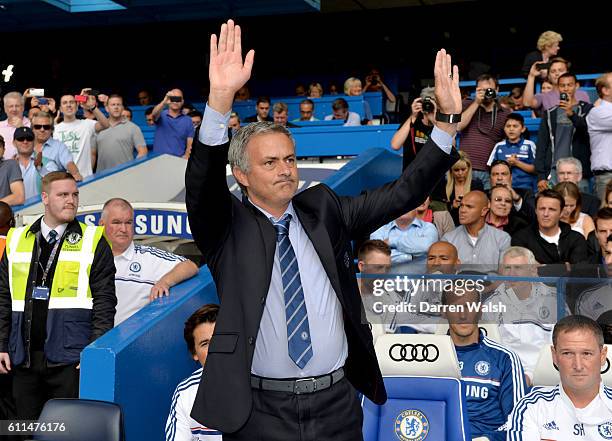 Chelsea manager Jose Mourinho waves to fans prior to kick-off