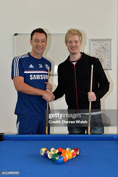 Chelsea's John Terry and world snooker number one, and big Chelsea supporter, Neil Robertson during a pool match at the Cobham Training Ground on 7th...