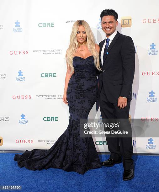 Aubrey O'Day and Pauly D arrive at the Metropolitan Fashion Week 2016 - La Vie En Bleu - Signature Event Benefiting Autism Speaks at Warner Bros....