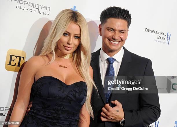 Aubrey O'Day and Pauly D arrive at the Metropolitan Fashion Week 2016 - La Vie En Bleu - Signature Event Benefiting Autism Speaks at Warner Bros....