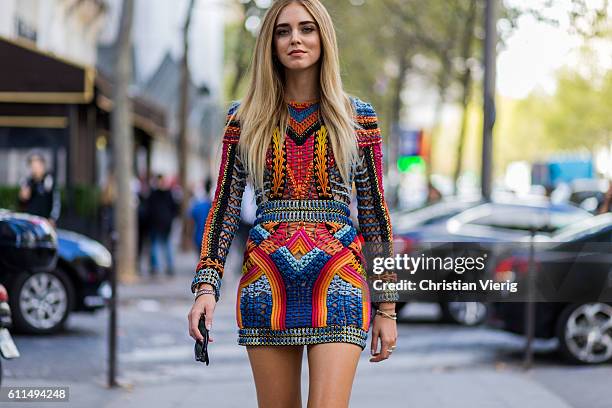 Chiara Ferragni wearing a Balmain dress and shoes outside Balmain on September 29, 2016 in Paris, France.