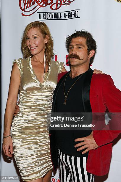 Shana Betz and Walker Babington arrive at the "Cherry Boom Boom" grand opening at the Tropicana Theater at Tropicana Las Vegas on September 29, 2016...