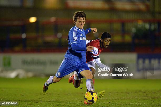 Chelsea's John Swift and Arsenal's Gedion Zelalem battle for the ball.