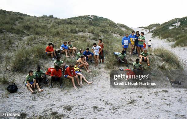 Chelsea players relax in between training runs.