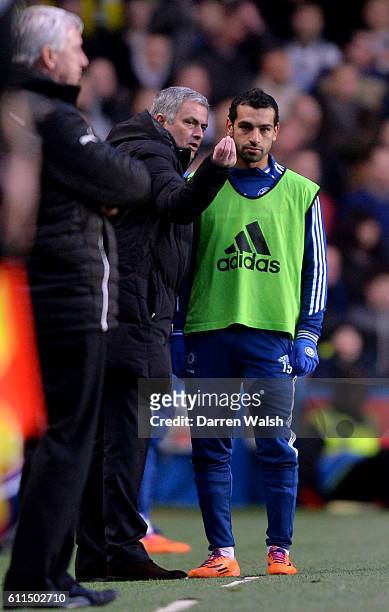 Chelsea's Mohamed Salah receives instructions from manager Jose Mourinho on the touchline