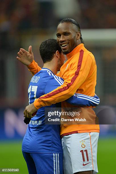 Galatasaray's Didier Drogba with Chelsea's Eden Hazard before kick-off