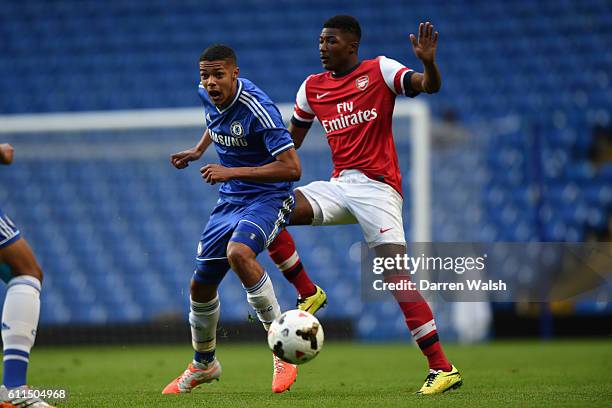 Chelsea's Jake Clarke Salter and Arsenal's Chuba Akpom during a FA Youth Cup Semi Final 1st Leg match between Chelsea U18 and Arsenal U18 at Stamford...