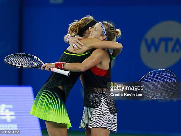 Bethanie Mattek-Sands of United States and Lucie Safarova of Czech Republic react after winning the semi-final match against Christina Mchale of...