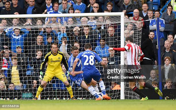 Sunderland's Adam Johnson tries to get a shot in on goal as Chelsea goalkeeper Mark Schwarzer looks on