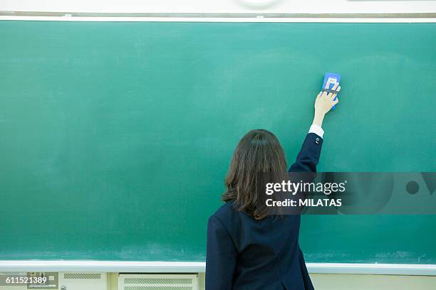 erase the blackboard - blackboard duster stock pictures, royalty-free photos & images