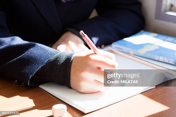 hand to write a letter to the notebook - report fun stock pictures, royalty-free photos & images