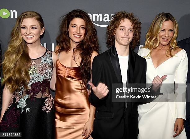 Actors Diana Hopper, Tania Raymonde, Britain Dalton and Maria Bello pose at the premiere screening of Amazon's "Goliath" at The London on September...