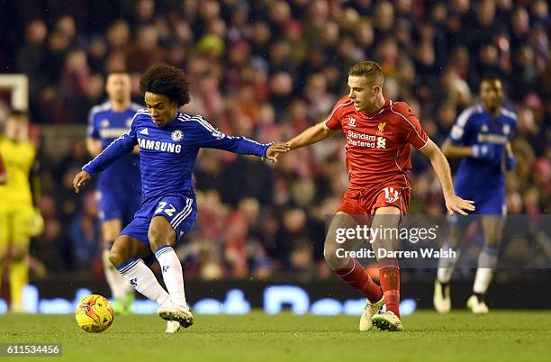 Chelsea's Willian and Liverpool's Jordan Henderson battle for the ball