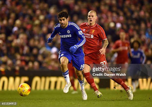 Chelsea's Diego Costa and Liverpool's Martin Skrtel battle for the ball