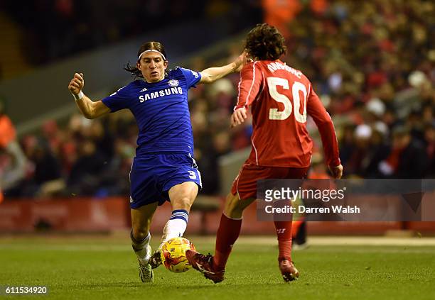 Chelsea's Filipe Luis and Liverpool's Lazar Markovic battle for the ball
