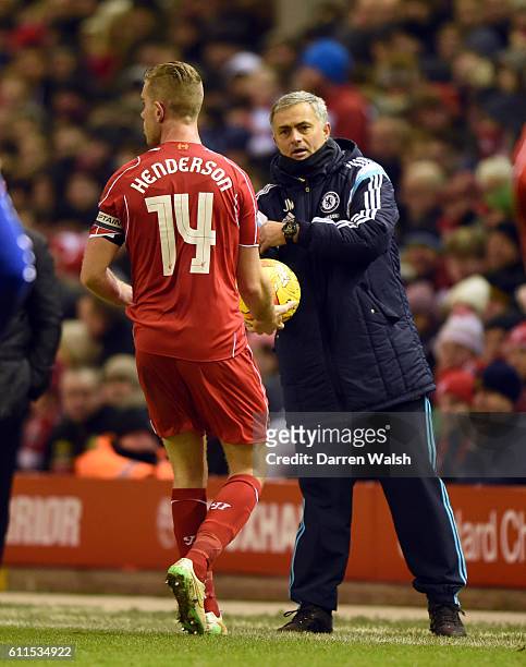 Chelsea manager Jose Mourinho gives the ball to Liverpool's Jordan Henderson