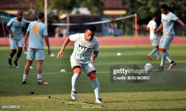 Northeast United FC's defender Reagan Singh and teammates take part in a practice session at The Indira Gandhi Athletic Stadium in Guwahati on...