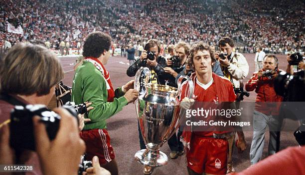 Winning goalscorer Trevor Francis and goalkeeper Peter Shilton parade the trophy after the 1979 European Cup Final between Nottingham Forest and...