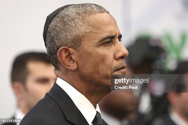 President Barack Obama looks on during the funeral of Shimon Peres at Mount Herzl Cemetery on September 30, 2016 in Jerusalem, Israel. World leaders...