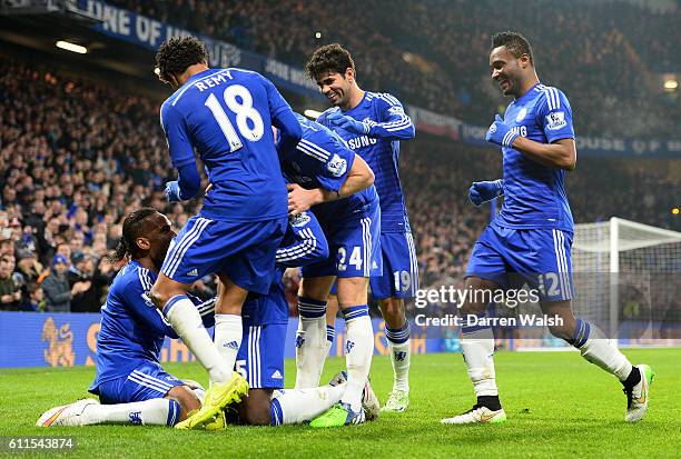 Chelsea's Kurt Zouma celebrates scoring his sides third goal of the match with team-mates.