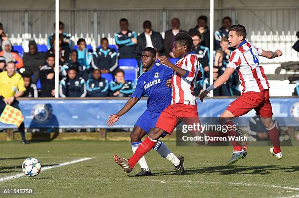 Chelsea's Jeremie Boga and Atletico Madrid's Nombo Otia battle for the ball