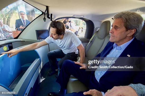Secretary of State John Kerry and Google co-founder Sergey Brin inside a Google self-driving car, Palo Alto, California, June 23, 2016. Image...