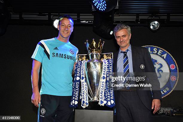 Chelsea's John Terry and manager Jose Mourinho celebrate with the Premier League Trophy