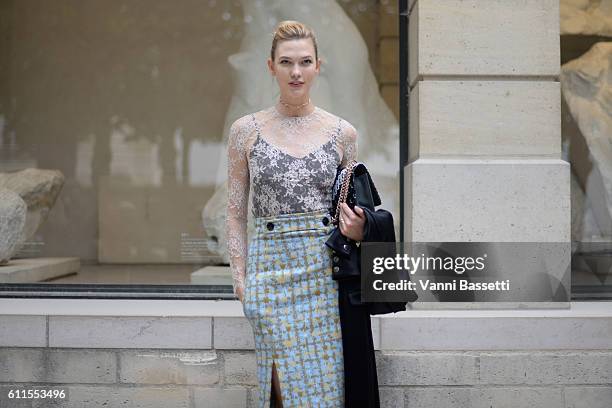 Karlie Kloss attends the Christian Dior show as part of the Paris Fashion Week Womenswear Spring/Summer 2017 on September 30, 2016 in Paris, France.