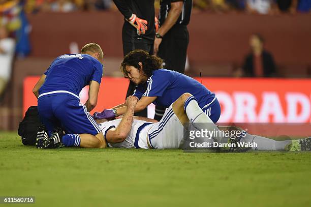 Chelsea's Gary Cahill lays injured after scoring the equaliser and is treated by Dr Eva Carneiro and Jon Fearn during a Pre Season Friendly match...