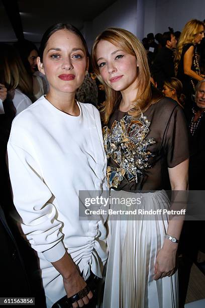 Marion Cotillard and Haley Bennett attend the Christian Dior show as part of the Paris Fashion Week Womenswear Spring/Summer 2017 on September 30,...