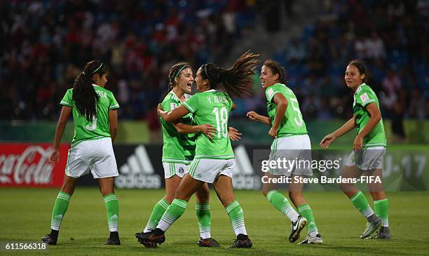 Veronica Avalos of Mexico celebrates scoring a goal with her team mates during the FIFA U-17 Women's World Cup Jordan 2016 Group A match between...