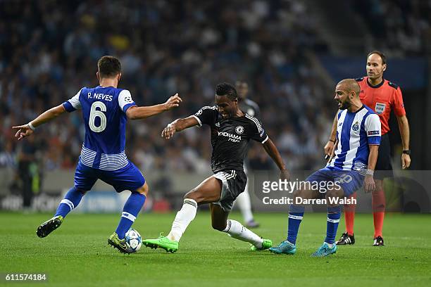 Porto's Ruben Neves and Chelsea's John Obi Mikel battle for the ball